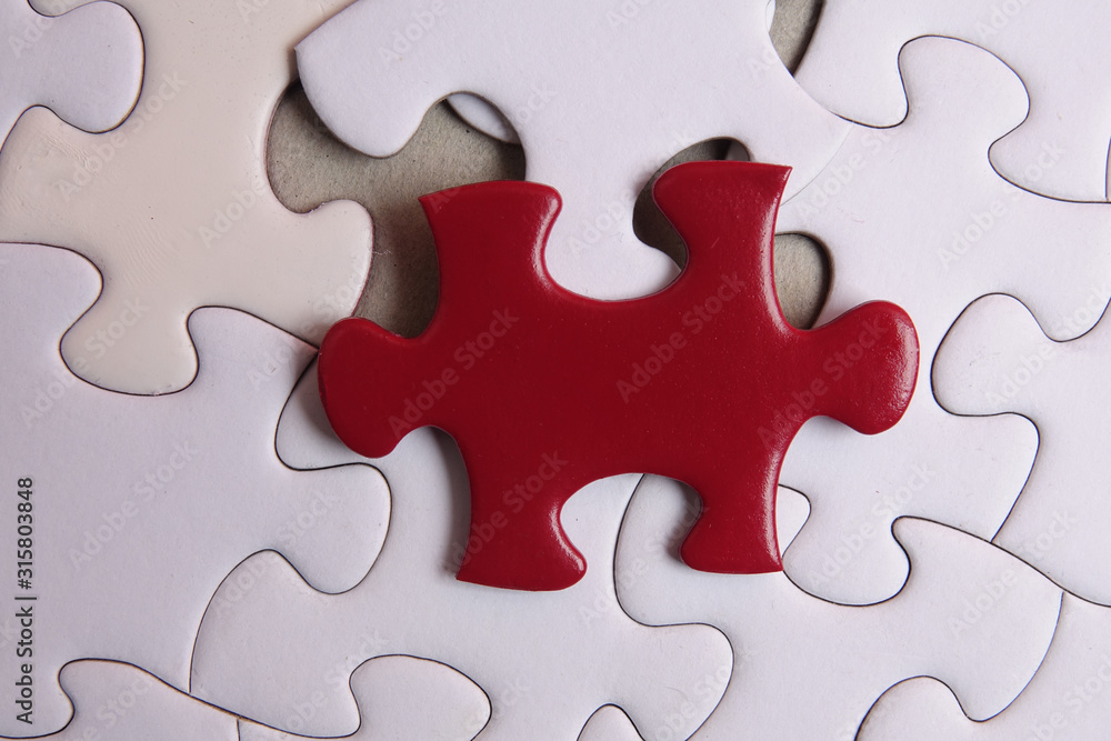 Red puzzle on white background. Copy space Red puzzle on white background. Copy space