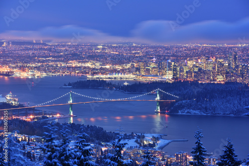 Lions Gate Bridge and Downtown Vancouver in winter with snow
