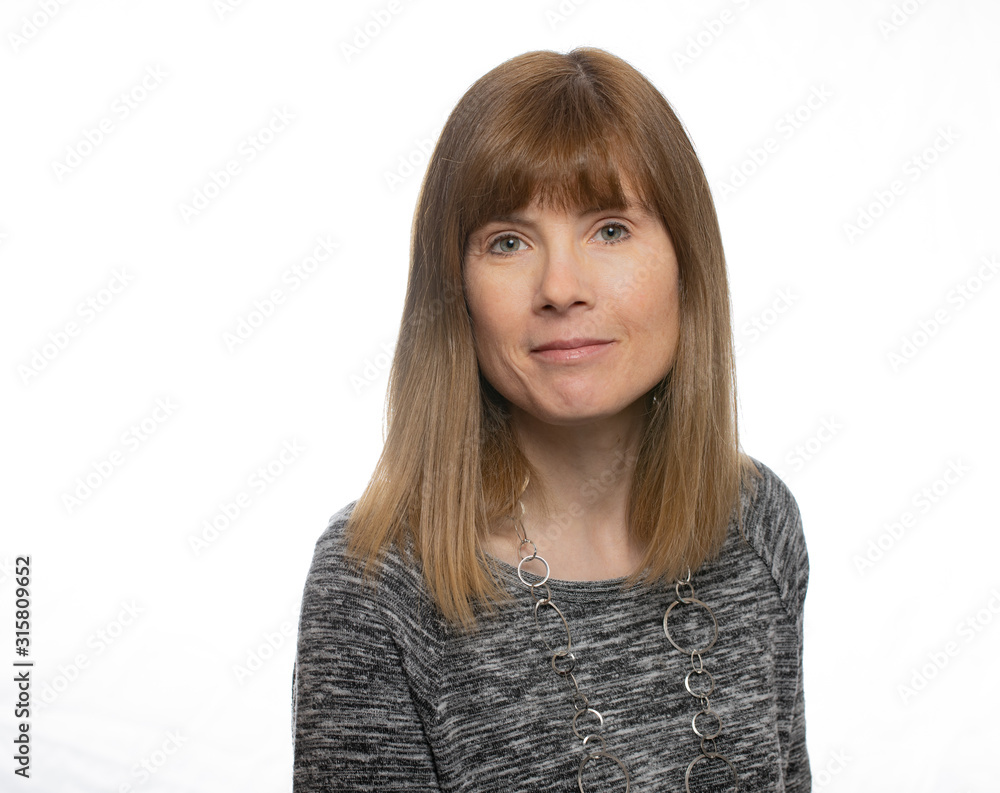 Blonde haired middle aged woman isolated on white background Blonde haired middle aged woman isolated on white background