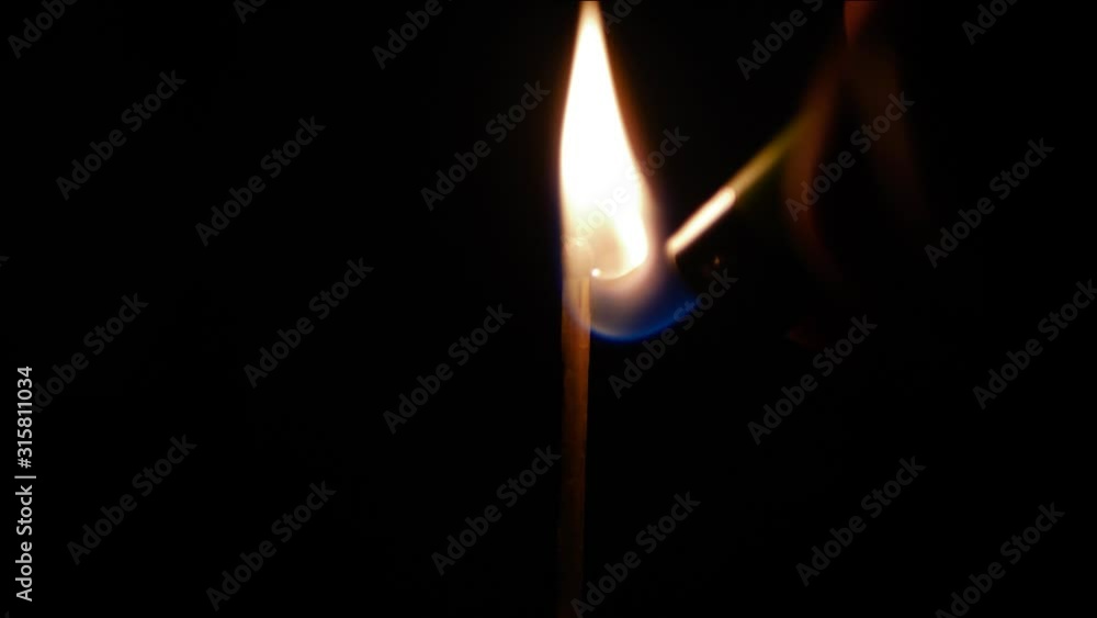 4K. Lighting a match. Burns down till total darkness 4K. Lighting a match. Burns down till total darkness