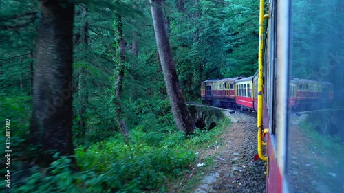 The Kalka–Shimla railway is a narrow-gauge railway in North India which traverses a mountainous route from Kalka to Shimla. photo