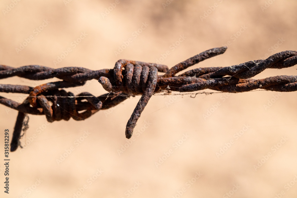 Old barbed wire that has been used to rust