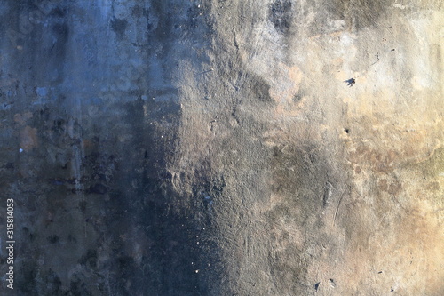 The pattern of the concrete background with the sunlight in Thailand