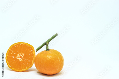 Wallpaper Mural sliced ponkam oranges, mini oranges  that is always present in the Chinese New Year event.  Torontodigital.ca