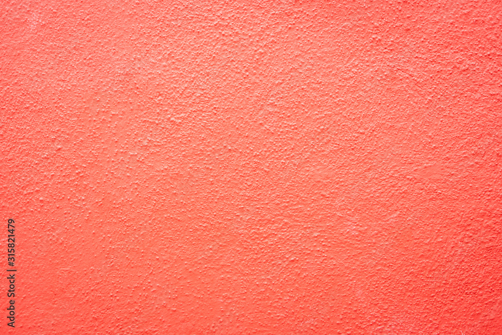 Fototapeta premium coral pink outdoor wall cement texture abstract background