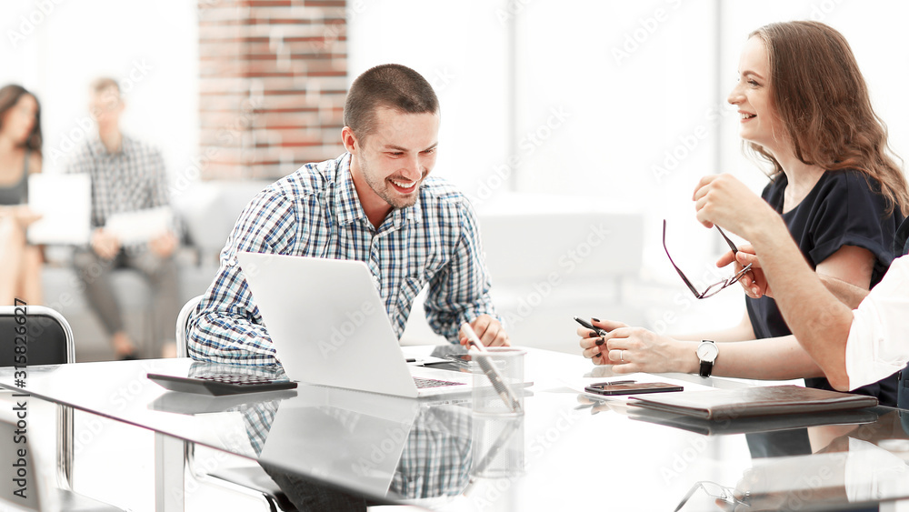 Fototapeta premium business team discussing new ideas sitting at the office Desk