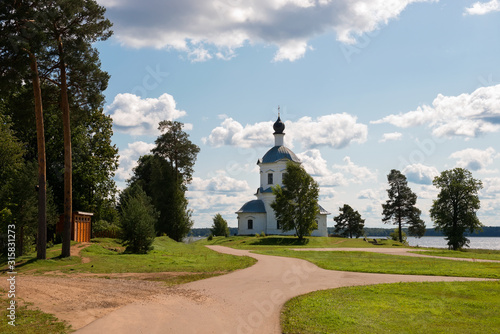 Church of the Exaltation of the Holy Cross in the Nile Desert. Nilo-Stolobenskaya Pustyn. Is situated on Stolobny Island in Lake Seliger. Tver region, Russia photo