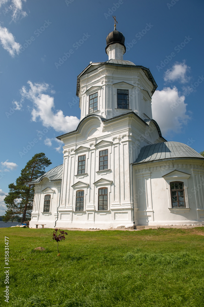 Church of the Exaltation of the Holy Cross in the Nile Desert. Nilo-Stolobenskaya Pustyn. Is situated on Stolobny Island in Lake Seliger. Tver region, Russia Church of the Exaltation of the Holy Cross in the Nile Desert. Nilo-Stolobenskaya Pustyn. Is situated on Stolobny Island in Lake Seliger. Tver region, Russia