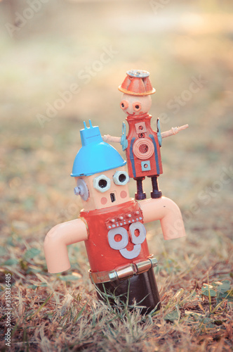 Assemblage daddy and son robot sculptures