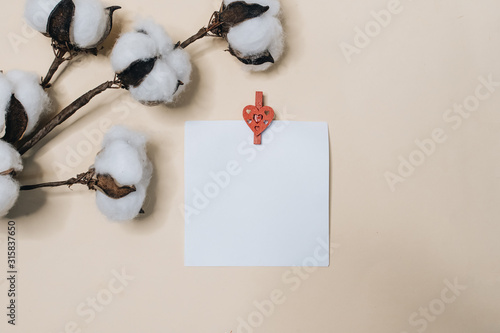 Top view of greeting blank card on beige
