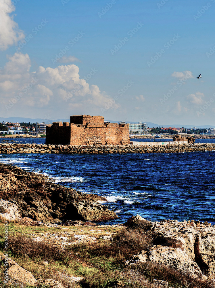 Cyprus, Paphos Castle, the Mediterranean Sea and houses in the distance