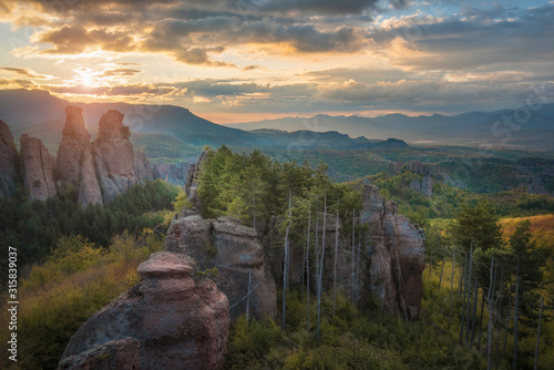 Beautiful landscape with bizarre rock formations. Stone stairs leading to the amazing rock formations and walls of a medieval fortress in Belogradchik, northwest Bulgaria. Panorama 