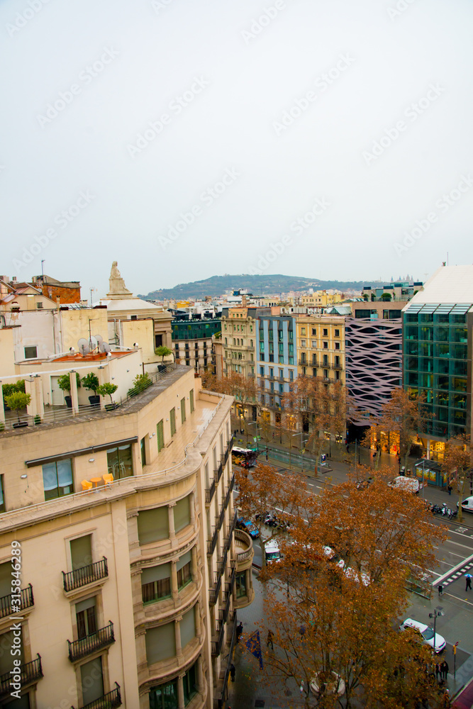 BARCELONA, SPAIN - January 23, 2019: Casa Mila is the famous art work by an artist Antoni Gaudi. Gaudi was a Spanish architect who designed many buildings in Barcelona, Spain...