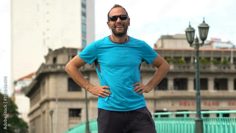 Portrait of happy sporty jogger in the city Portrait of happy sporty jogger in the city