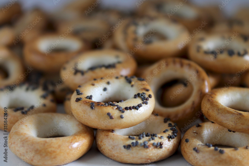 Small pastries for tea and coffee: small dried cookies with poppy seeds