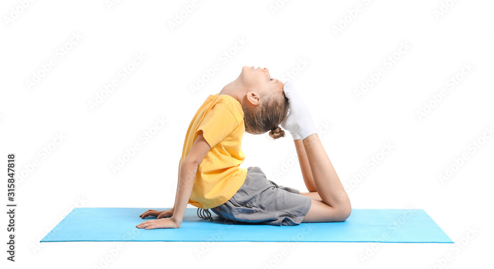Obraz premium Little girl practicing yoga on white background