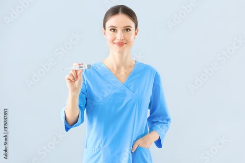 Portrait of female doctor w...