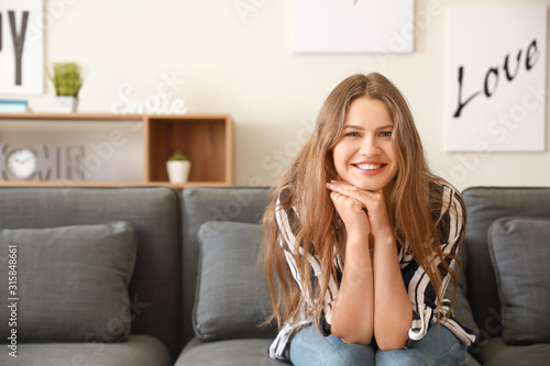 Smiling young woman relaxin...