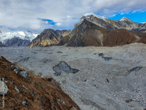 View on Ngozumpa glacier, the longest glacier in the Himalayas. Everest base camp trek itinerary: Gokyo village, Solokhumbu, Nepal. photo