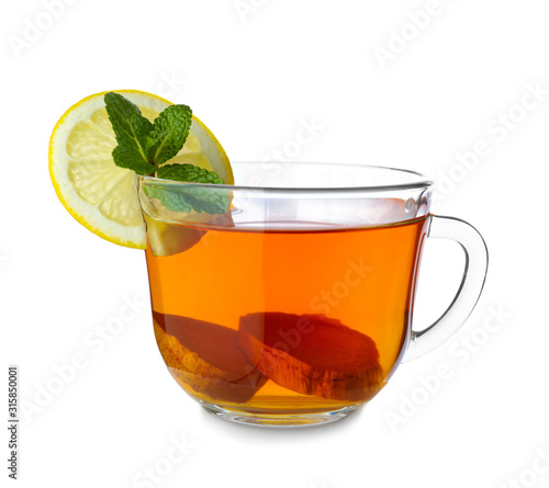 Cup of tasty ginger tea on white background