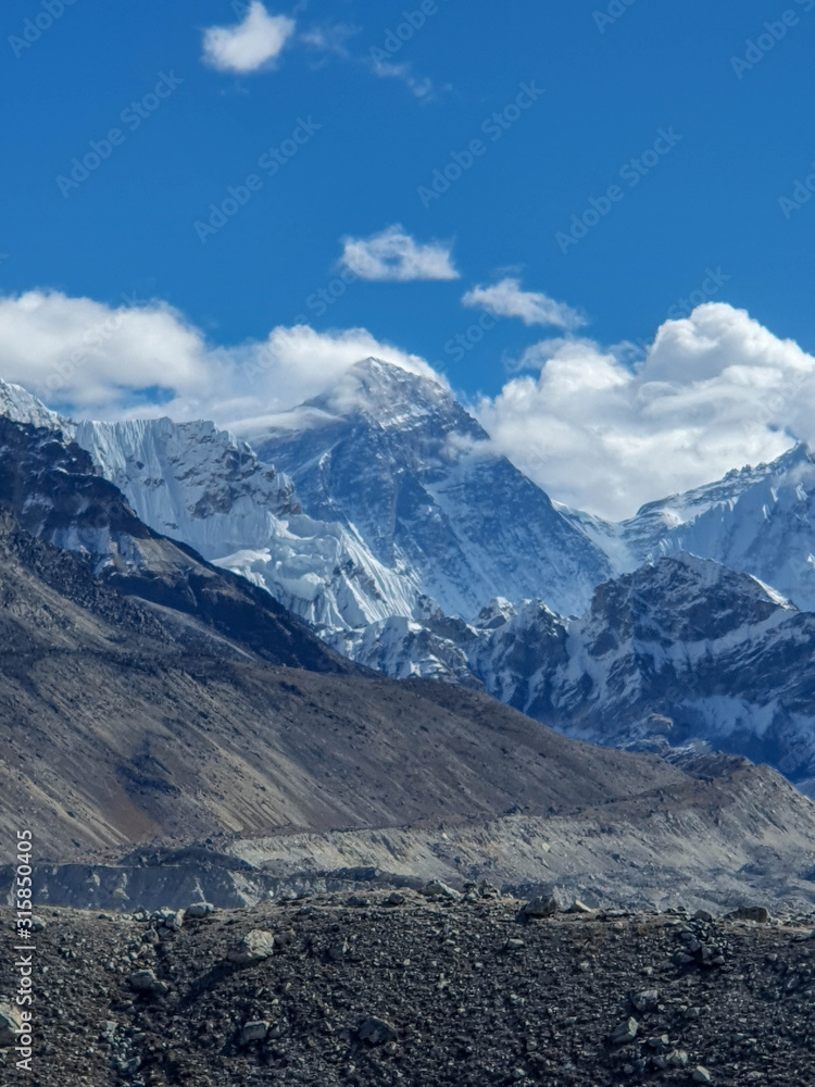 View on Everest, Nuptse and other great mountains. Near Ngozumpa Tsho, the fifth Gokyo lake. Sunny day and marvellous blue sky. Gokyo lakes and Cho Oyu base camp trek, Solokhumbu, Nepal.