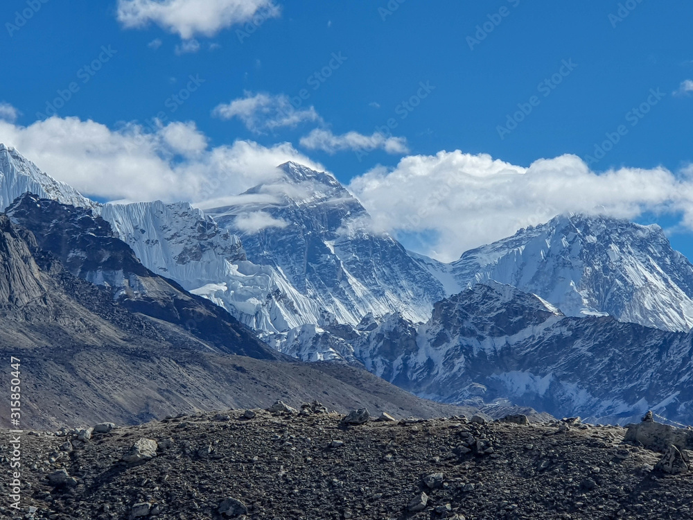 View on Everest, Nuptse and other great mountains. Near Ngozumpa Tsho, the fifth Gokyo lake. Sunny day and marvellous blue sky. Gokyo lakes and Cho Oyu base camp trek, Solokhumbu, Nepal.