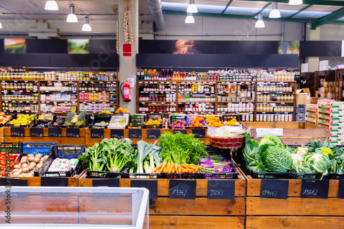 Eco products store counter with large assortment of vegetables