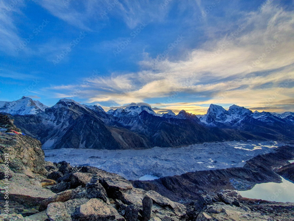 Picturesque view on mountains and Ngozumpa glacier from Gokyo Ri at sunrise. Trekking in Solokhumbu, Nepal, Himalayas.