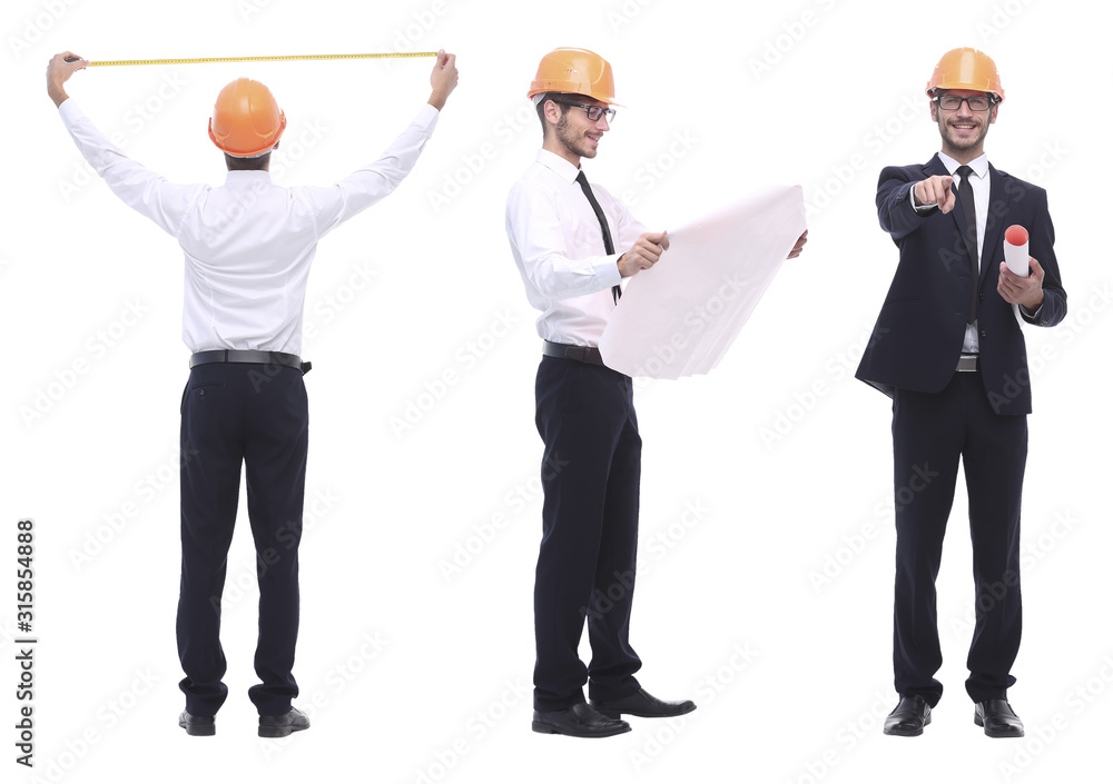 in full growth .successful architect engineer in orange helmet. in full growth .successful architect engineer in orange helmet.