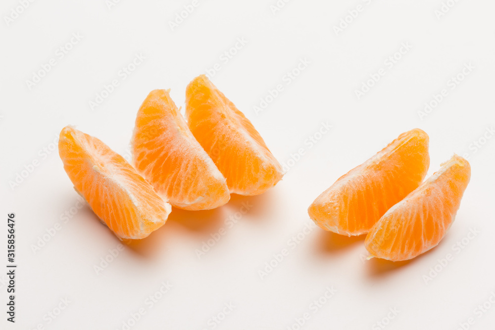 Tangerine orange-skinned sweet fruit of the citrus family. Tangerine orange-skinned sweet fruit of the citrus family.