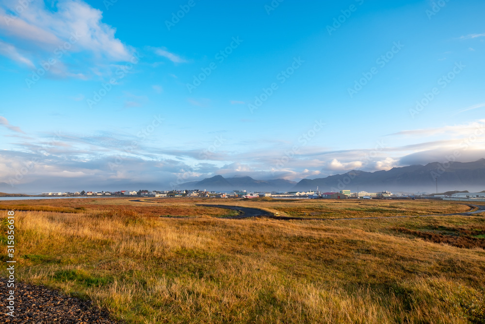 Landscape near Hoffn, autumn colors blue sky in Iceland