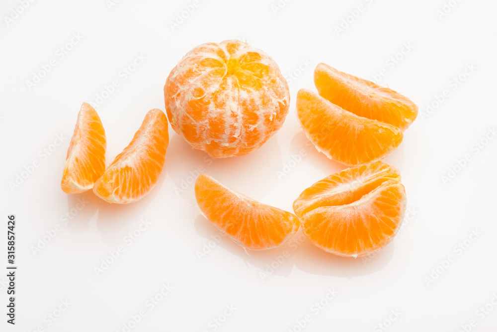 Tangerine orange-skinned sweet fruit of the citrus family. Tangerine orange-skinned sweet fruit of the citrus family.