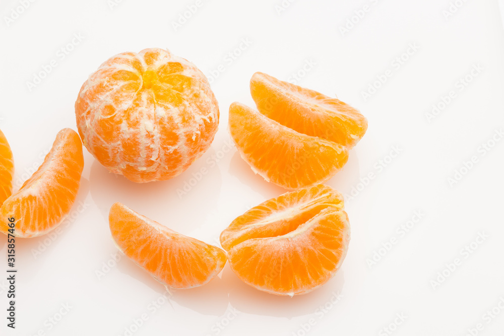 Tangerine orange-skinned sweet fruit of the citrus family. Tangerine orange-skinned sweet fruit of the citrus family.