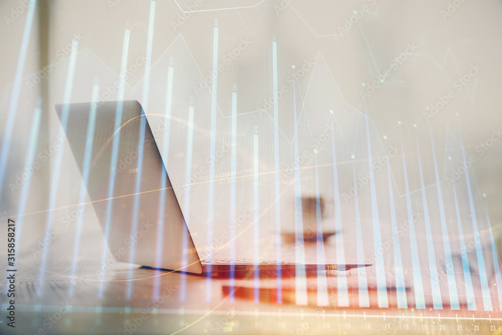 Multi exposure of graph and financial info and work space with computer background. Concept of international online trading. Multi exposure of graph and financial info and work space with computer background. Concept of international online trading.