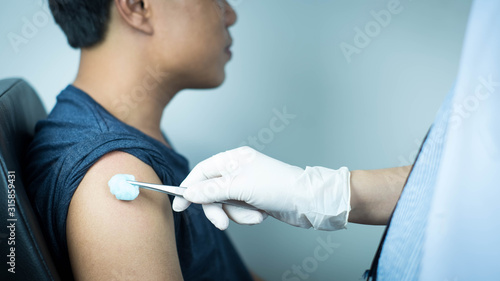 The doctor carried a syringe to treat and gave the patient a Sein measurement.Vaccination concept. Healthcare  hospital and medical diagnostics.