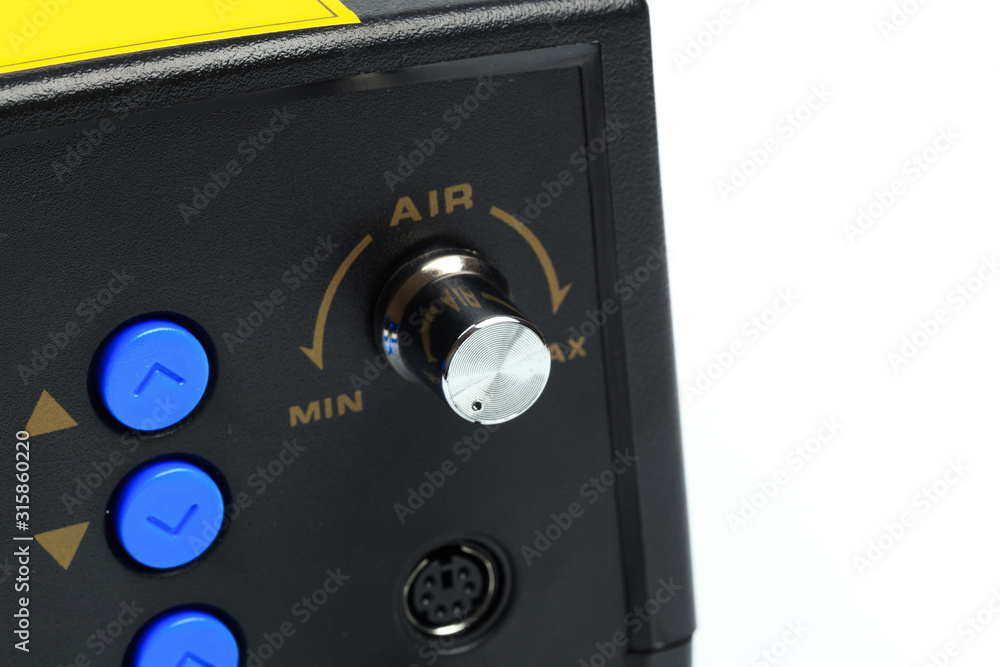 Soldering station with LED display, heating control regulator, with hot air gun and soldering iron. Isolated on a white background. - Image Soldering station with LED display, heating control regulator, with hot air gun and soldering iron. Isolated on a white background. - Image