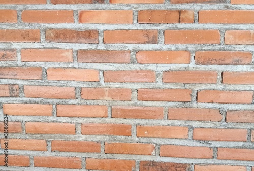 The red brick wall is beautiful and can be used as a background.