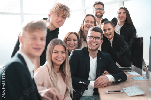 portrait of a happy business team in the workplace.