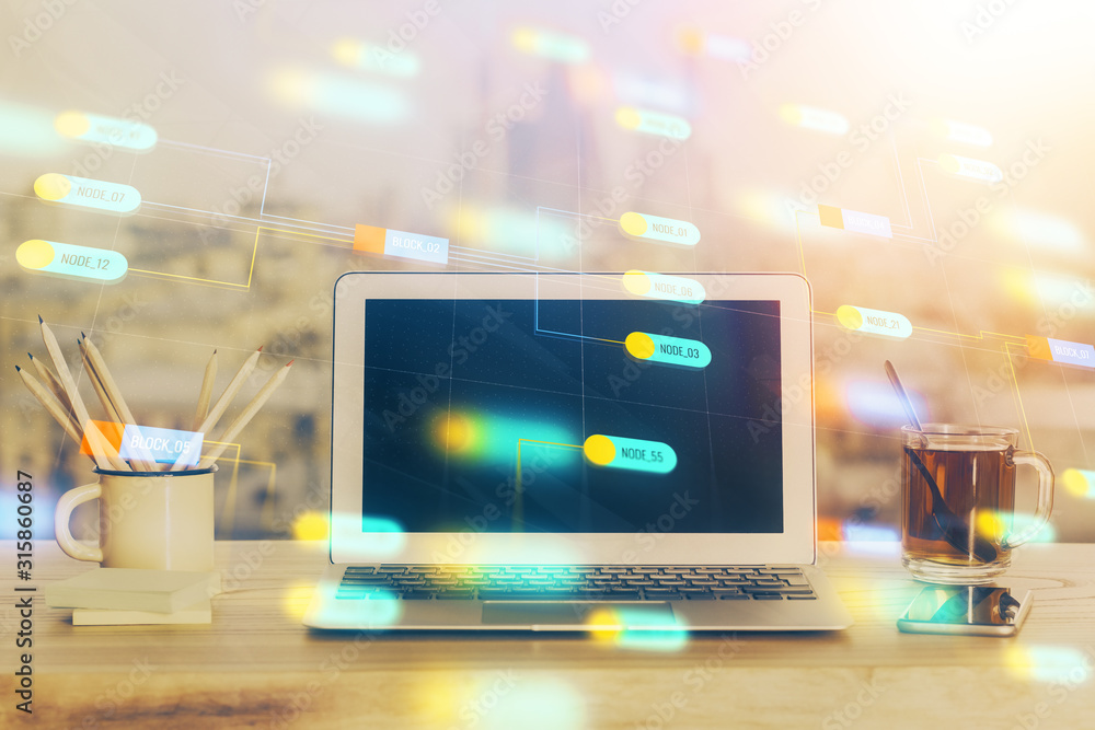 Double exposure of laptop computer and technology theme hologram. Concept of freelance work. Double exposure of laptop computer and technology theme hologram. Concept of freelance work.