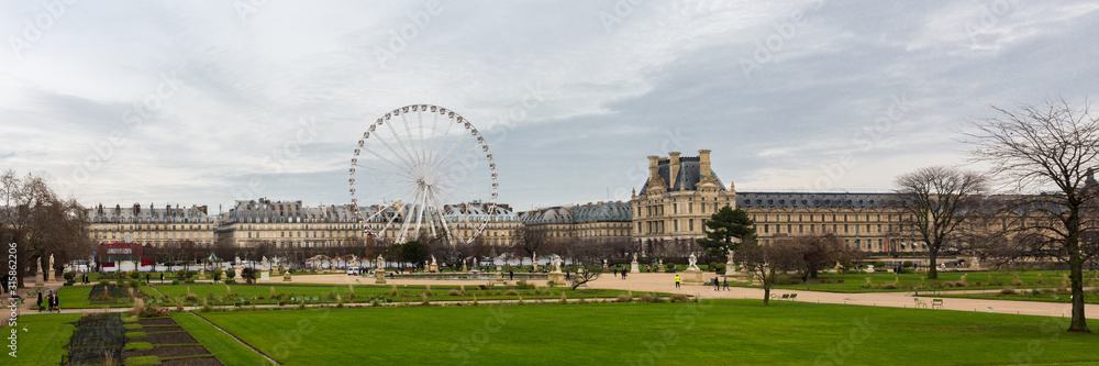 PARIS, FRANCE - Dec 16, 2019: Panorama of Tuileries Garden (Jardin des Tuileries). In the middle the 