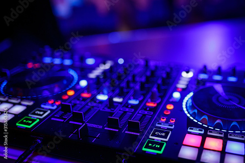 closeup view of a DJ's mixing desk