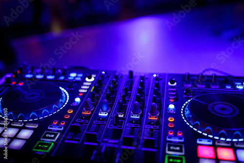 closeup view of a DJ's mixing desk