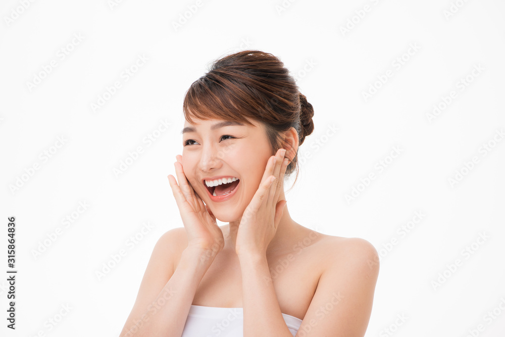 Portrait of Beautiful Skin care woman enjoy and happy, touching her face,isolated with clipping path. Portrait of Beautiful Skin care woman enjoy and happy, touching her face,isolated with clipping path.