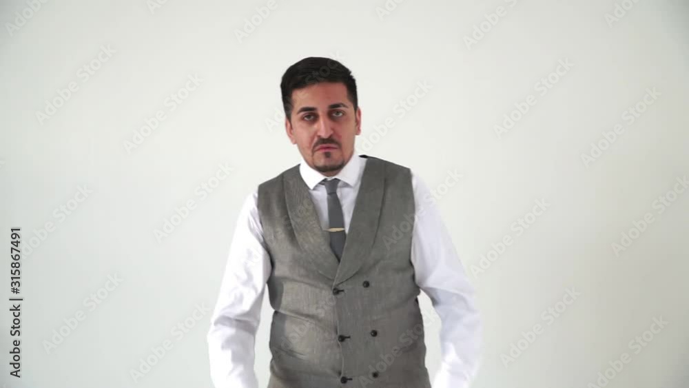 An Arab man demonstrates refusal by crossing his arms. The guy says no An Arab man demonstrates refusal by crossing his arms. The guy says no