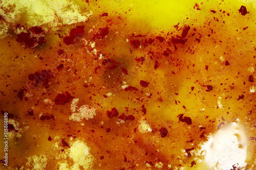 Abstract of red liquid in salt water
