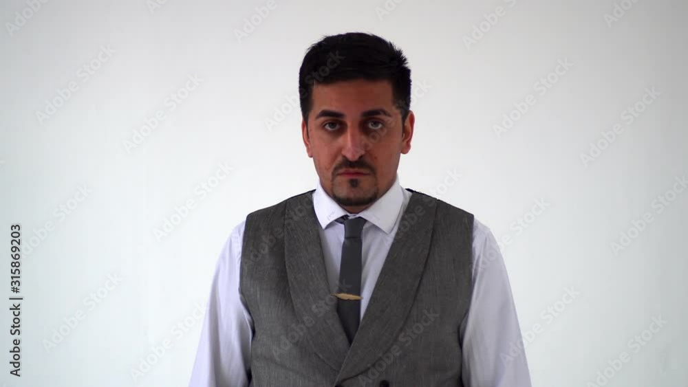 a shocked look from an Eastern man. The Arab shows emotions of surprise a shocked look from an Eastern man. The Arab shows emotions of surprise
