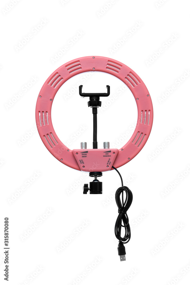 Closeup of circular neon LED lamp isolated white background. Popular modern light for make-up and beauty portraits. Closeup of circular neon LED lamp isolated white background. Popular modern light for make-up and beauty portraits.