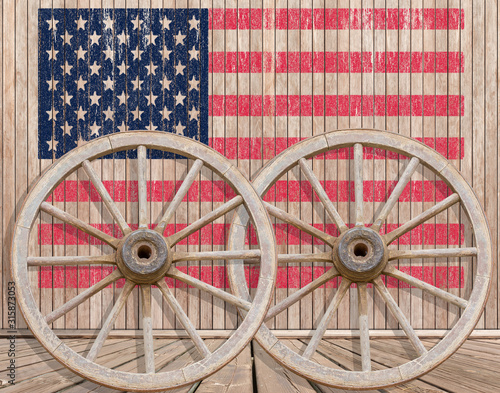 American flag, wheel on wood background