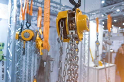 Lever winch. Tal lever. Manual chain hoist. Shallow depth of field. Focus on Chain Link photo