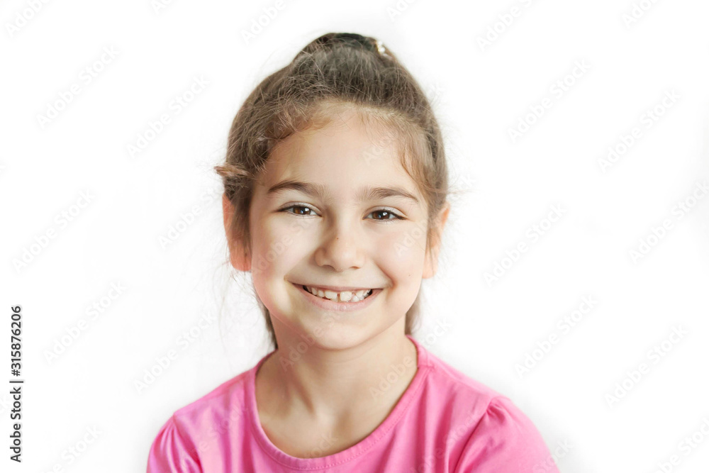 Portrait of happy smiling child girl isolated on white background. Laughing people. Positive emotions. Portrait of happy smiling child girl isolated on white background. Laughing people. Positive emotions.